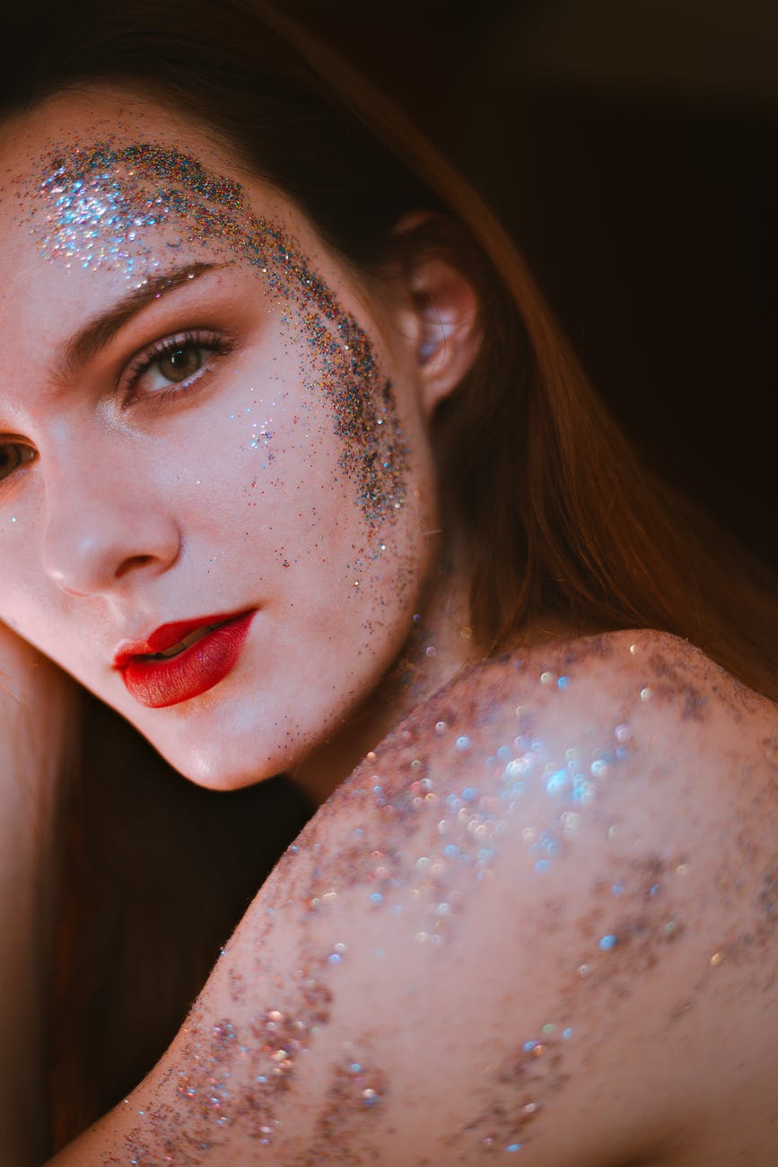 woman covered in glitters